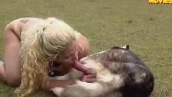 Big ass blonde plays with the dog in the back yard