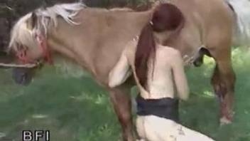 Tight female drives entire horse dick into her mouth
