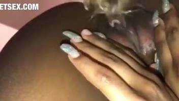 Black babe getting fucked by her white dog's red cock