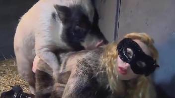 Masked blonde feels entire dog dick in her ass