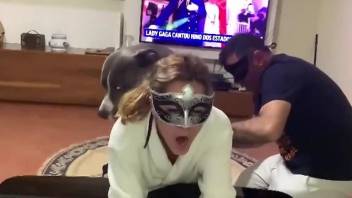 Masked hottie screaming during HARD dog fucking